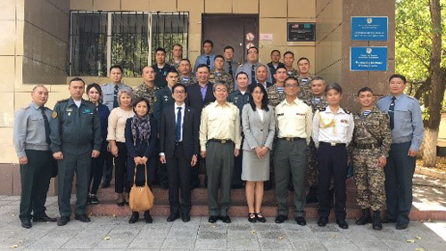 Group photo in front of the PKO center