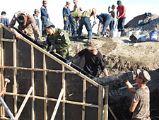 Pouring concrete into the framework