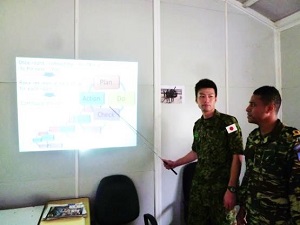A JGSDF member makes a presentation