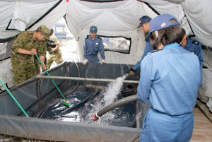 海自入浴支援の移転に伴う入浴支援準備_石巻市本間屋ﾊﾟｰｷﾝｸﾞ